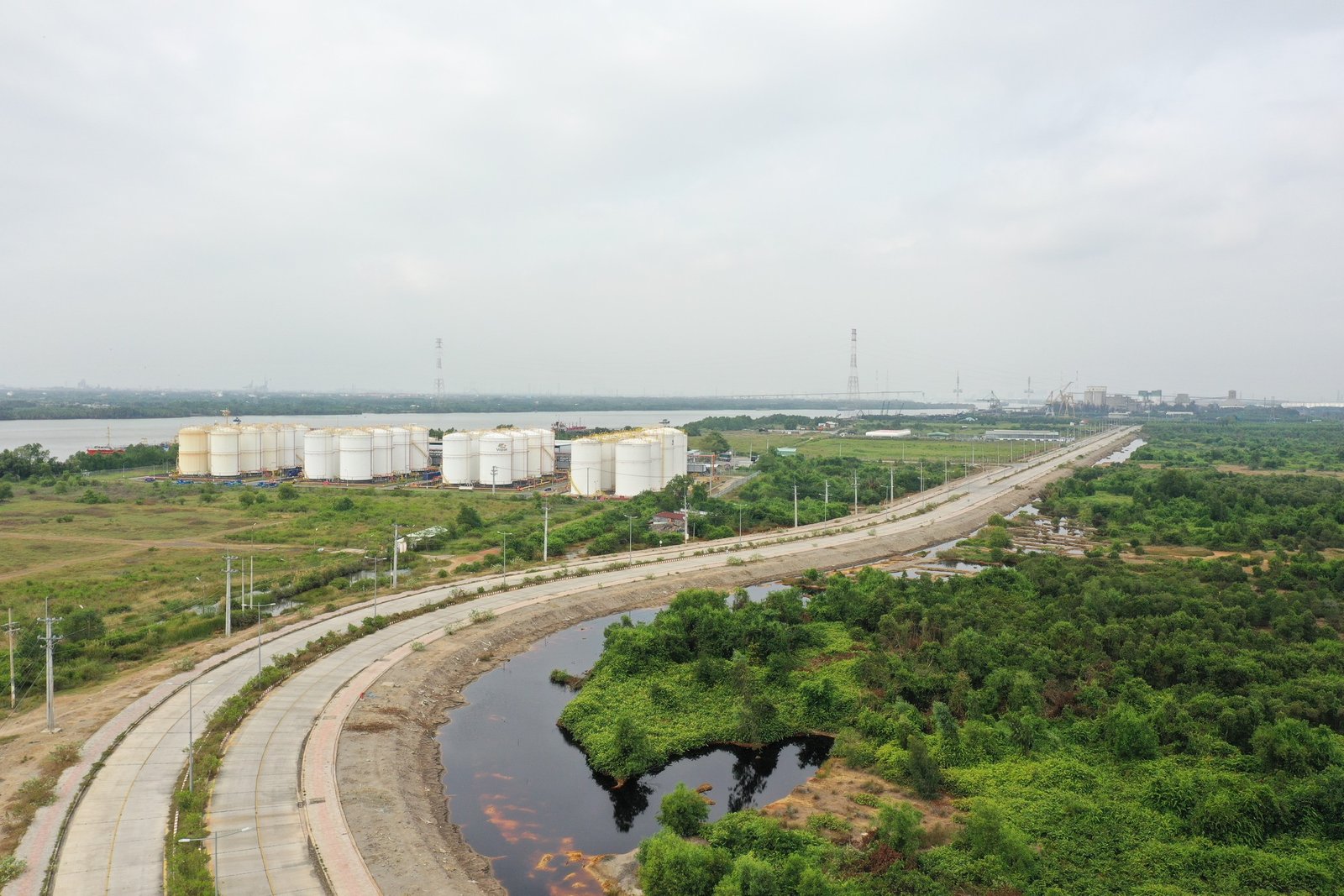 Aerial view of the Long Tau River corridor and industrial infrastructure at Ong Keo
